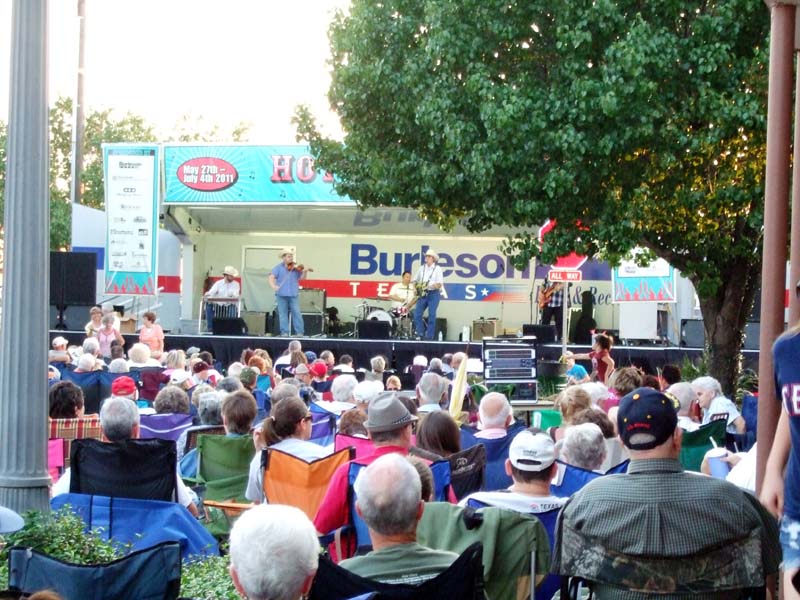 photo of crowd listening to band perform